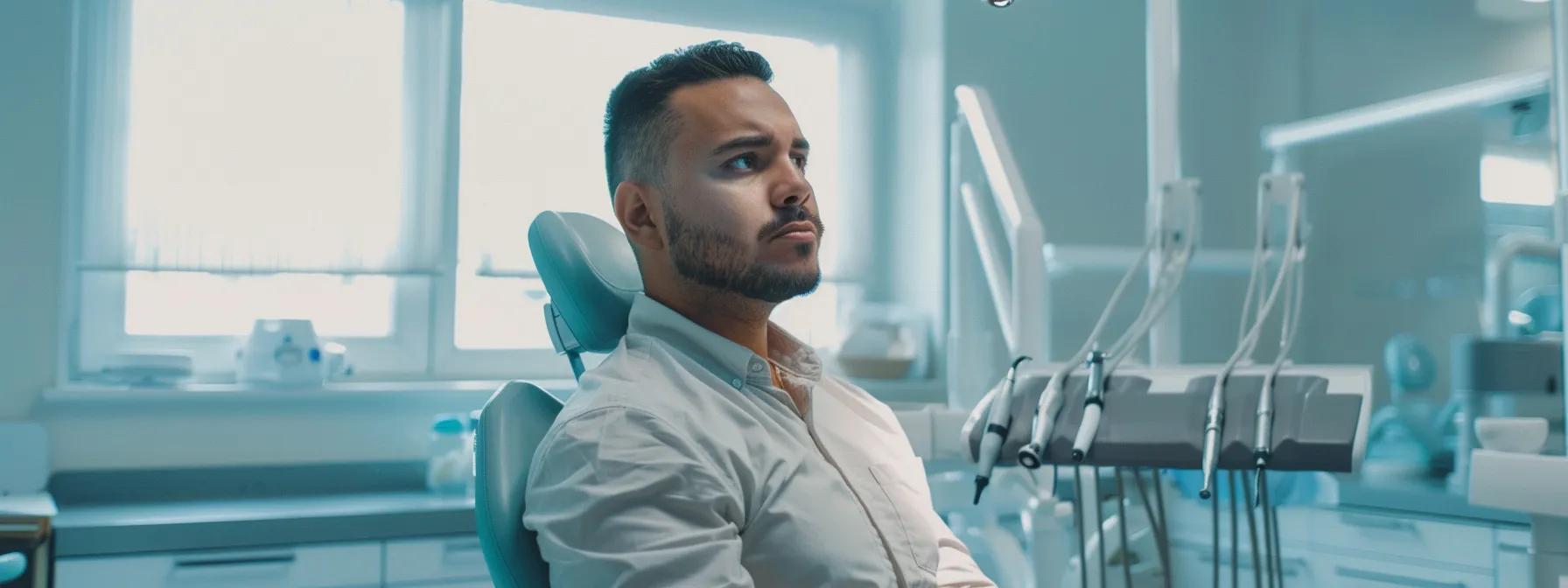 a concerned patient sits in a modern dental clinic, gazing at a dental chair and equipment, with a bright, clean atmosphere emphasizing the urgency of losing a filling or crown and the importance of immediate care.